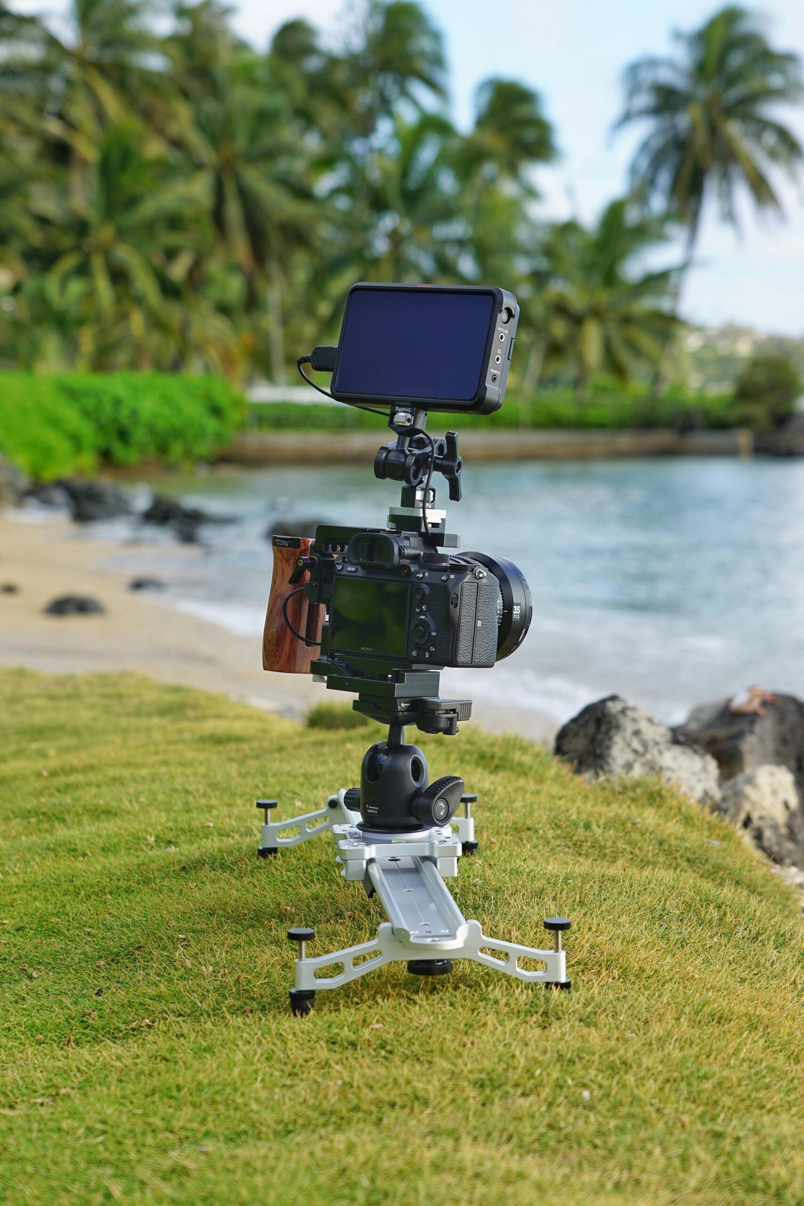 Landscape photographer capturing mountains and sky with a camera that has wide dynamic range